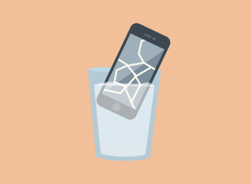 broken phone in a glass of water